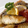 Gebakken kabeljauw met sinaasappeltomatensaus