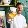 De kunst van het vieren: kleurrijke illustraties sieren Duvel designerglas 2023