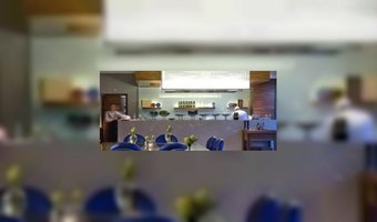 Okura viert Bib voor Serre Restaurant